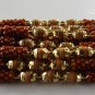 Tulsi/Basil Brown Beads Rakhi in Gold Tone With brown beads by Teknowear.