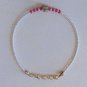 Fuchsia Gold Crystal Rakhi/Bracelet With Ivory Beads By Teknowear