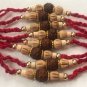 Rudraksha Rakhi With Turmeric & Basil Beads by Teknowear