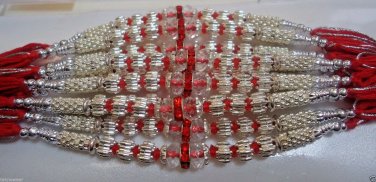 Rakhi in Silver With Glass Beads & Red Crystals By Teknowear
