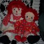 Two Raggedy Ann Dolls