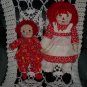 Two Raggedy Ann Dolls