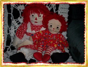 Two Raggedy Ann Dolls