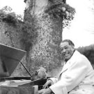 Duke Ellington playing piano and smiling.  - 8x10 photo