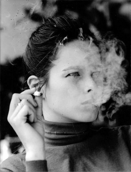 Geraldine Chaplin smoking. - 8x10 photo