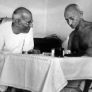 Mahatma Gandhi talking with C Rajgopalcharia. - 8x10 photo