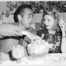 Humphrey Bogart with woman. - 8x10 photo