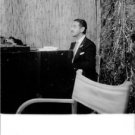 Jaime de Mora y Aragón playing on a piano. - 8x10 photo