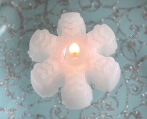 12 Small snowflake floating candles. Dinner party wedding reception table centerpiece d&Atilde;&copy;cor