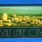 VINTAGE MARVELOUS SALT LAKE CITY SKYLINE POSTCARD MEMENTO WASATCH MOUNTAIN RANGE