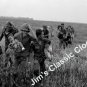 Vietnamese Rangers Rush Chidren To Waiting Helicopter April 1974 B&W Poster