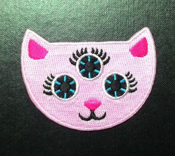 Cute Demon Pink cat three eyes iron on patch.