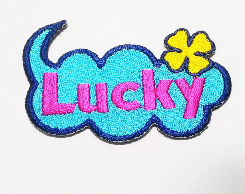 Cute text blue lucky flower iron-on patch.