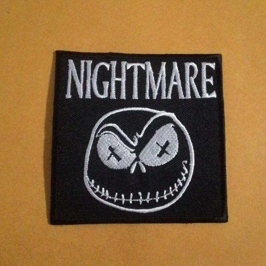 Nightmare embroidered iron on patch.