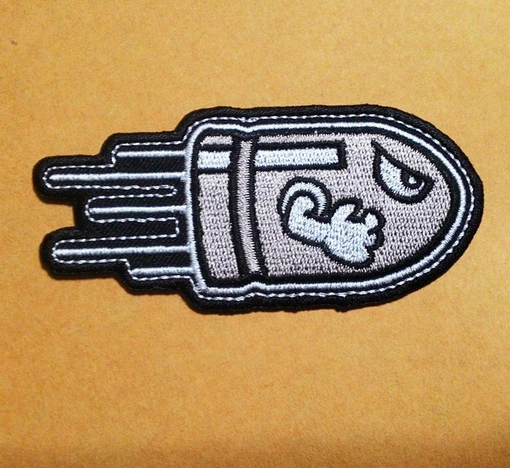 Gray bullet ammunition bullet bill iron on patch.