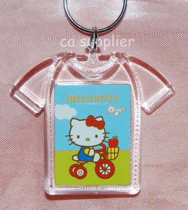 2005 Sanrio T Shirt Shape Hello Kitty Key Ring 2.5"W x 2"L - Cycling