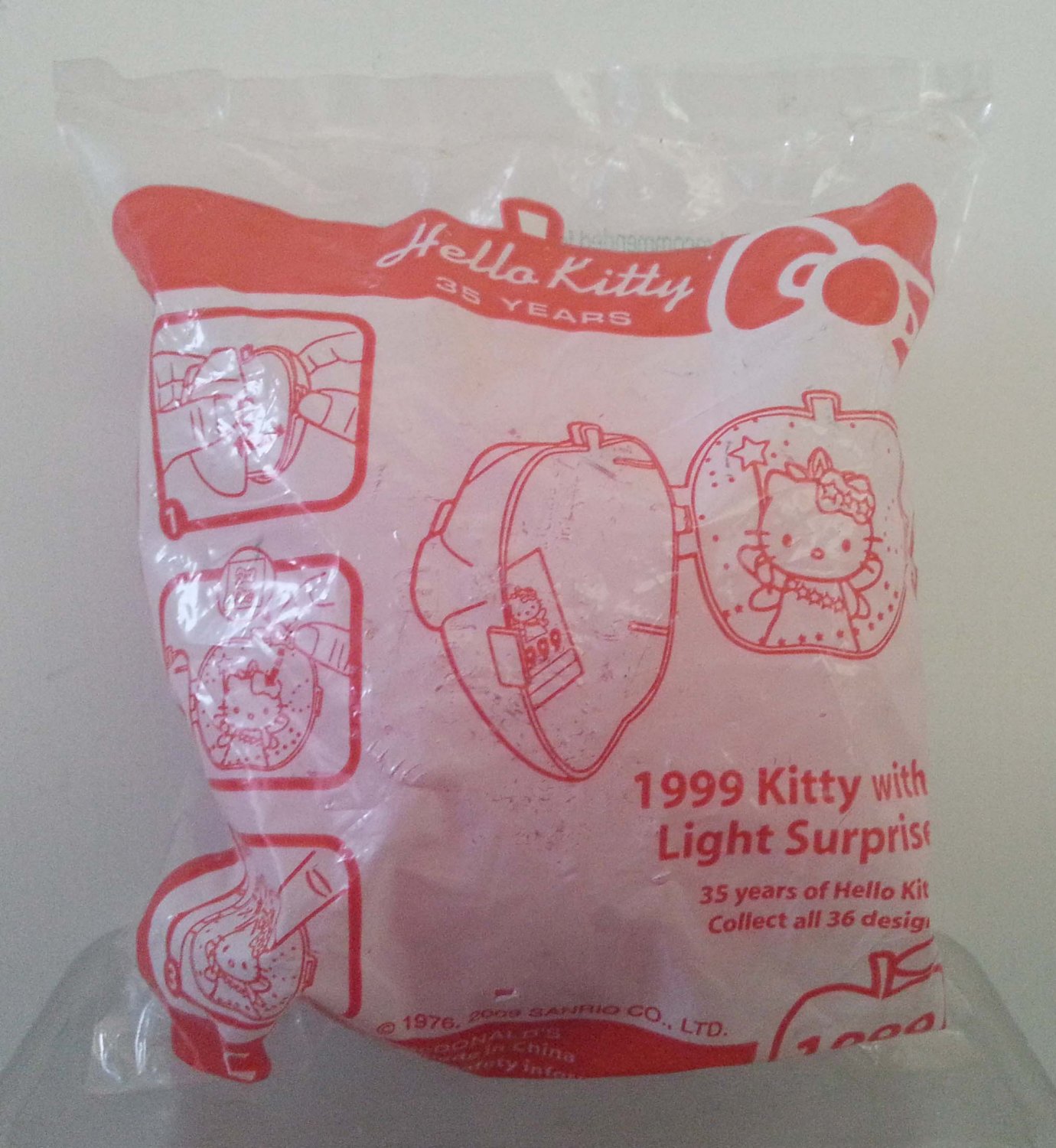 2009 McDonald's Sanrio Hello Kitty 35 Years - 1999 Kitty with Light Surprise