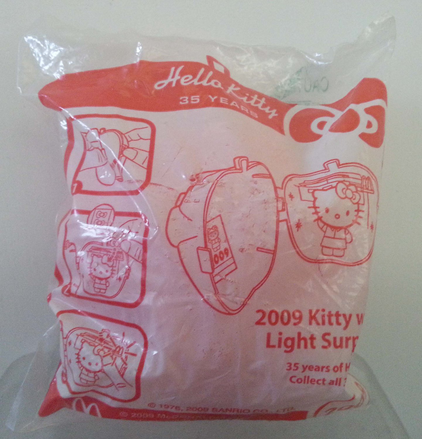 2009 McDonald's Sanrio Hello Kitty 35 Years - 2009 Kitty with Light Surprise