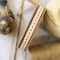 East of India Cream Thin Stitched ribbon