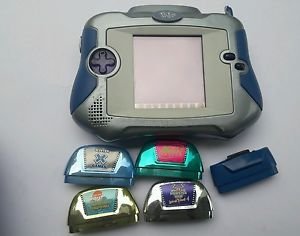 Used Pixter handheld game with 4 game 1 adapter and case holder