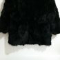Long black raccoon fur coat o collar