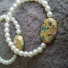 Faux pearl and marbled stone hoop earrings