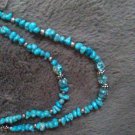 Turquoise stone with silver accents and spacers