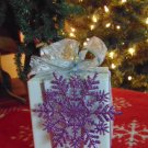 Rustic Wooden White Present w Sheer Bow and Purple Snowflake