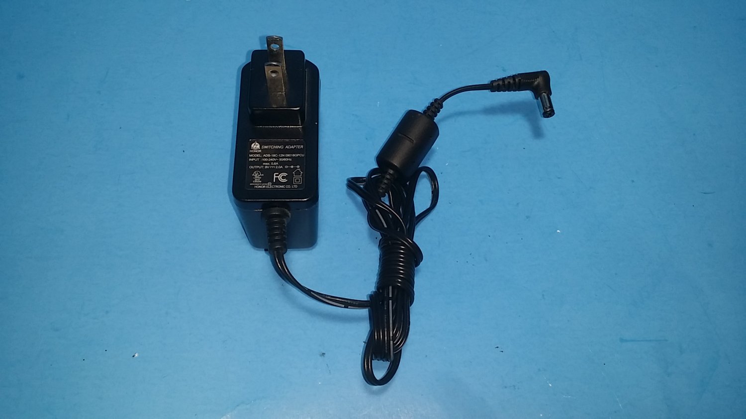 Honor ADS-18C-12N AC Power Adapter 090118GPCU 9V 2A