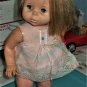 Vintage 1964 Baby First Step walking doll by Mattel with original dress