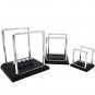 Newton's Cradle Art in Motion Balance Balls Physics Pendulum Science Wave Desk