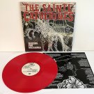the SAINT CATHERINES dancing for decadence RED VINYL Lp Record with lyric insert