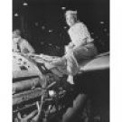 A female riveter working on the fabrication of an airplane Poster Print by Stocktrek Images - 11x17