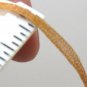 Unbranded Flat Tan Ribbon Thread Marked NAS Color 1104 62grs 1/8" Ribbon?