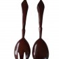 Wooden Serving Spoon And Fork Faces On Dark Handles