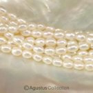 FRESHWATER PEARLS 16.1 inch Strand 7 mm Lustrous Cream White OVAL China 15 g