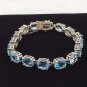 SKY BLUE TOPAZ CUT OVALS (16) SET IN STERLING SILVER 925 TENNIS BRACELET 8"