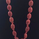 Wendy Mink burnt orange Beaded necklace gold tone & tasle pendent