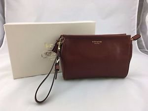 COACH BROWN LEATHER WRISTLET