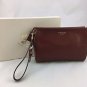 COACH BROWN LEATHER WRISTLET