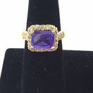 14k gold ring w/purple glass stone and crystals Size 8