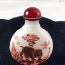 Chinese Red Carved snuff Bottle with Tiger Scene
