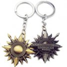 Set of 2  Silver and Gold Game of Thrones Keychain House Martell of Sunspear!