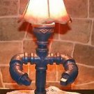 Handcrafted Vintage industrial pipe sitting man lamp/shade and cup in Blue