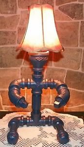 Handcrafted Vintage industrial pipe sitting man lamp/shade and cup in Blue