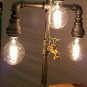 Handcrafted Industrial Pipe Three Tier steampunk style lamp with spigot
