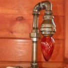 Handcrafted Industrial Pipe Lamp steampunk style in chestnut with amber bulb