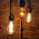 Industrial Pipe Three Tier Lamp steampunk style with vintage bulbs