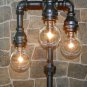 Industrial Pipe Three Tier Lamp steampunk style with vintage globe bulbs