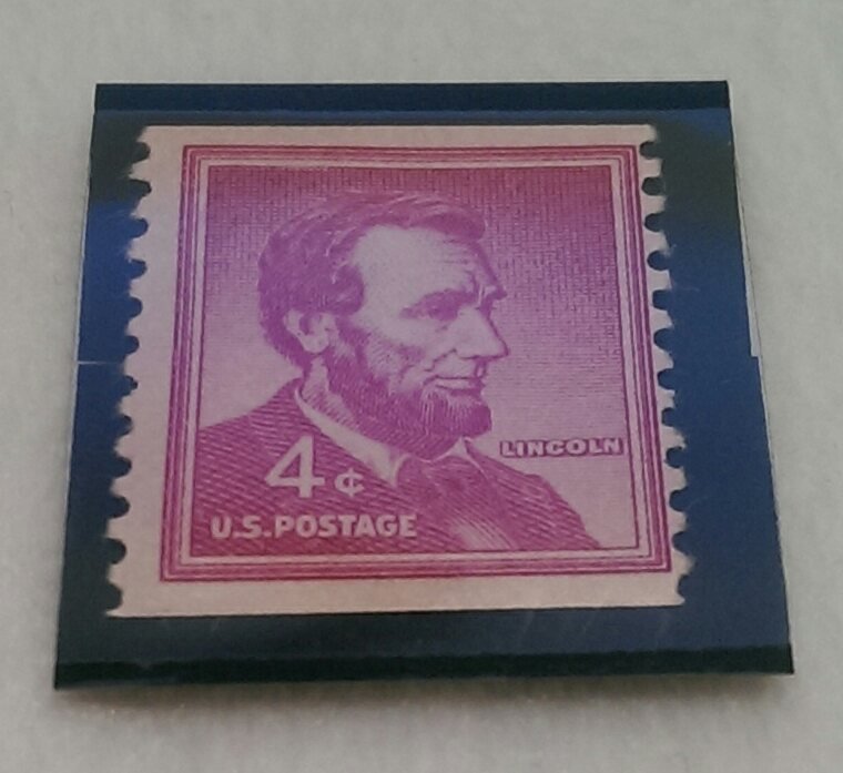 Purple 4cent Lincoln U.S. Postage Stamp